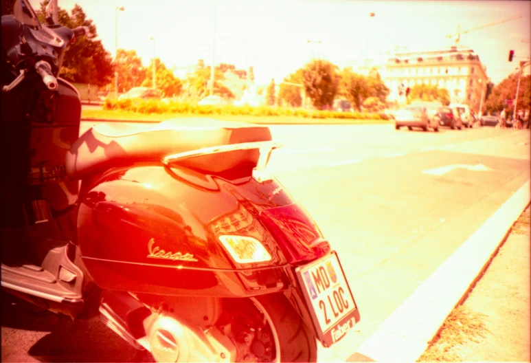 a motor bike parked on the side of the road