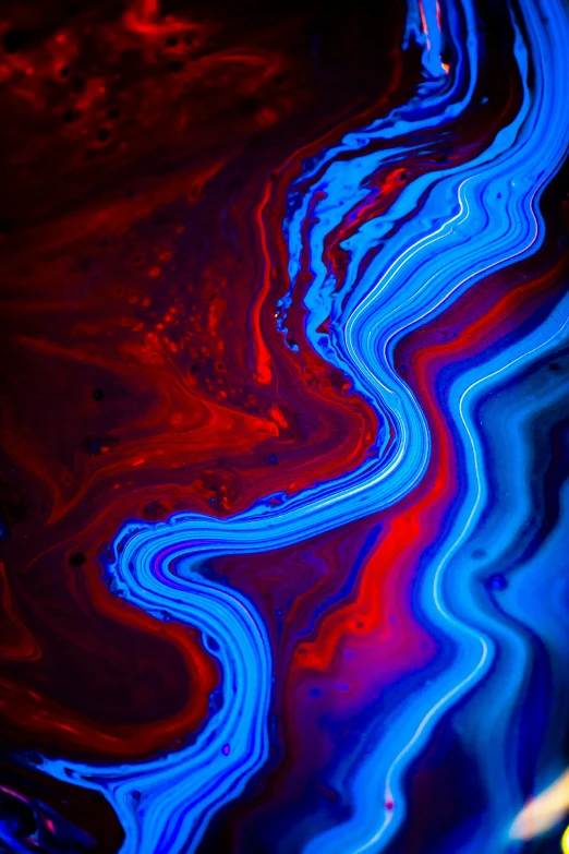 a red and blue water painting in the center of it