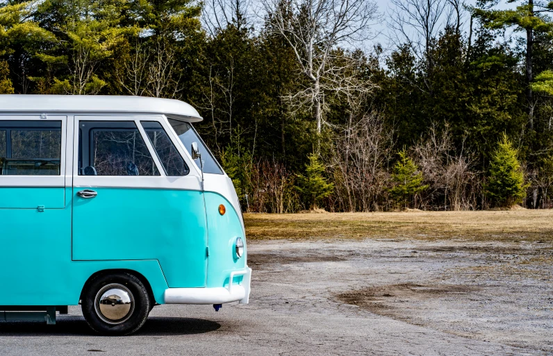 a small van that is parked on the side of the road