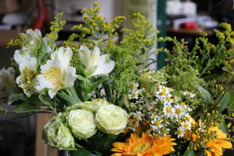 colorful flowers in a vase are shown here