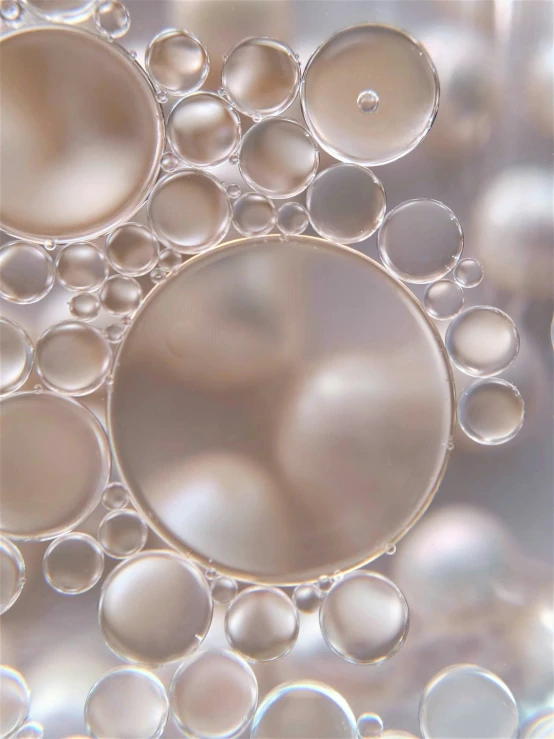 bubbles in a closeup picture of some liquid