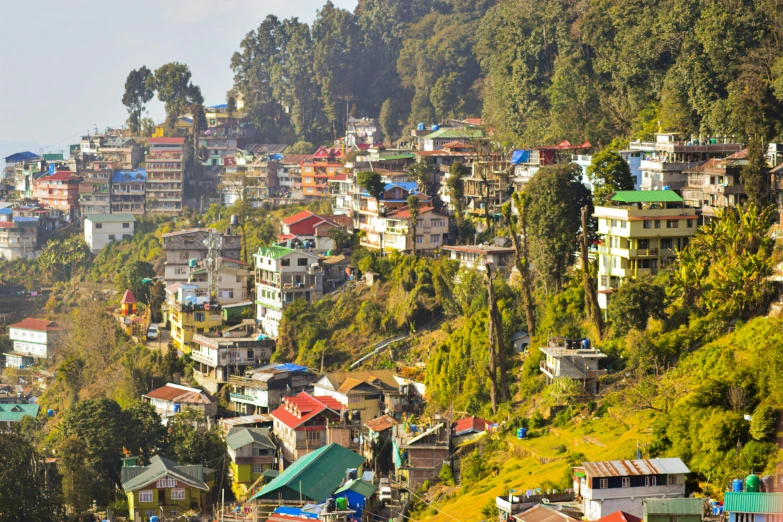 small village in mountain overlooking wooded area