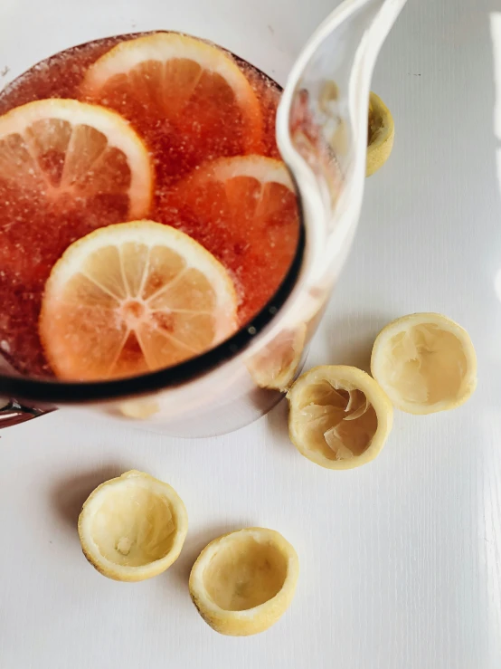citrus fruit sliced up and served in a bowl