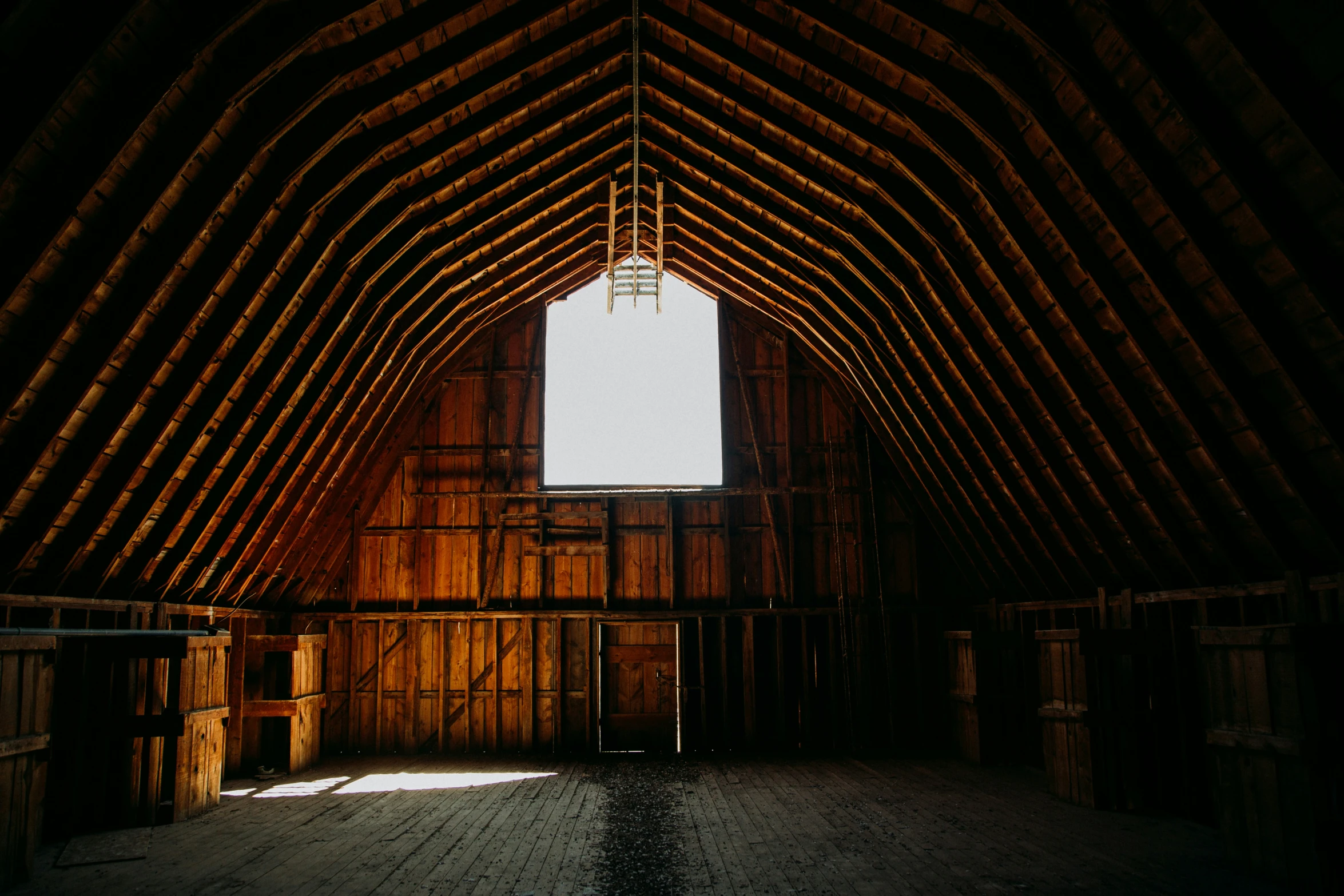 the interior of an old building with large windows