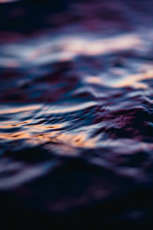 the surface of a body of water is blurred