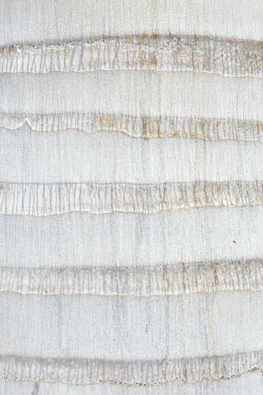 many white and gray lines of sand near each other