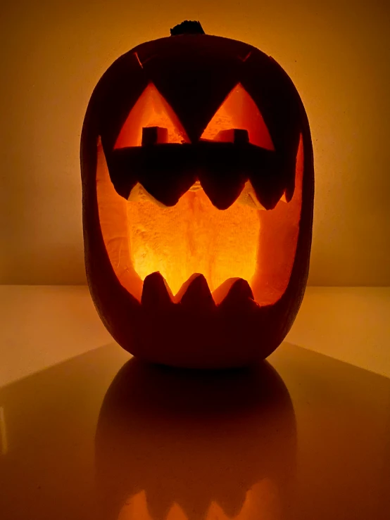 a carved pumpkin on display with it's eyes open