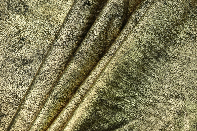 a close up view of a piece of tan linen