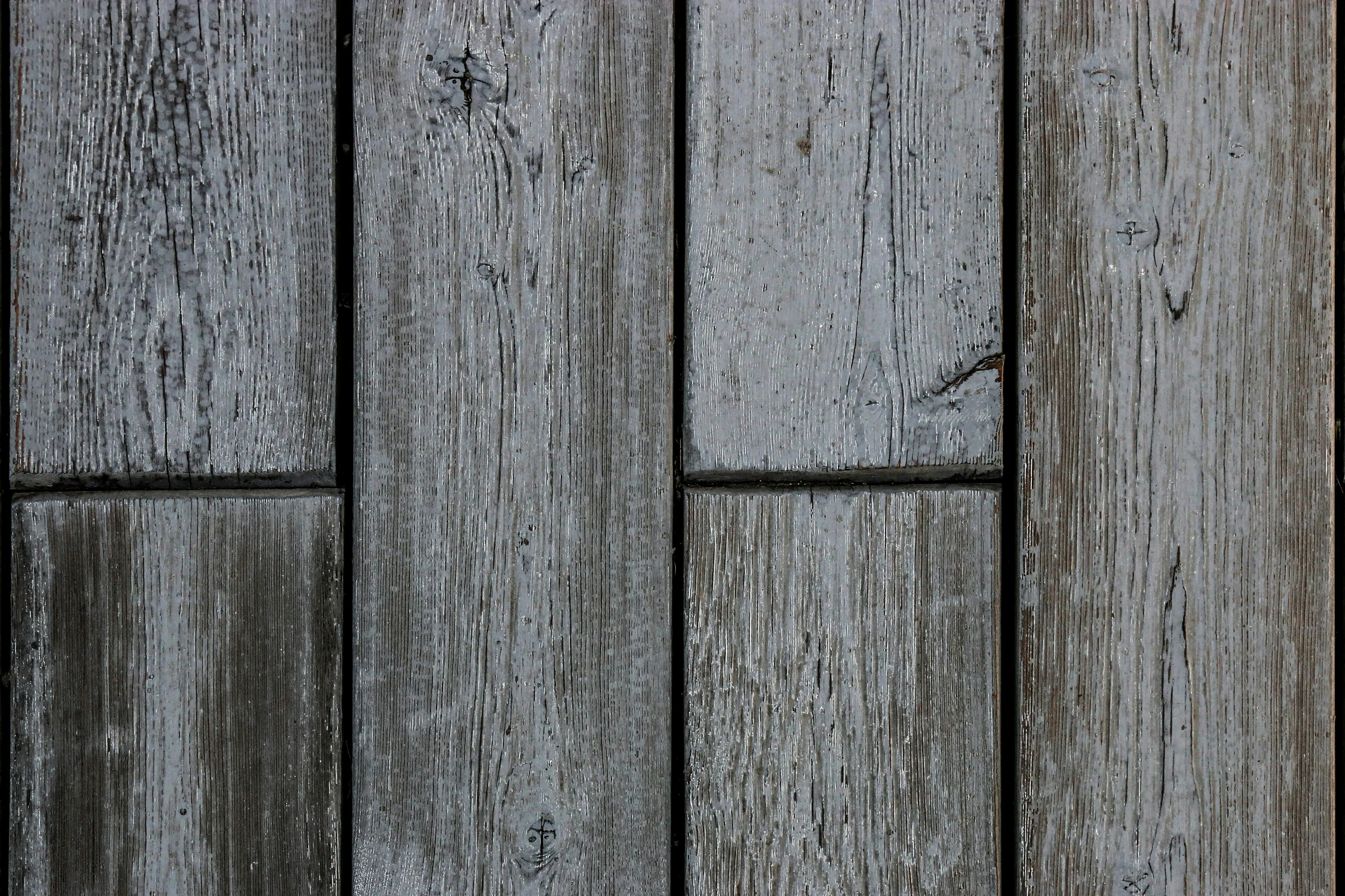 a close up of the rough, wooden walls