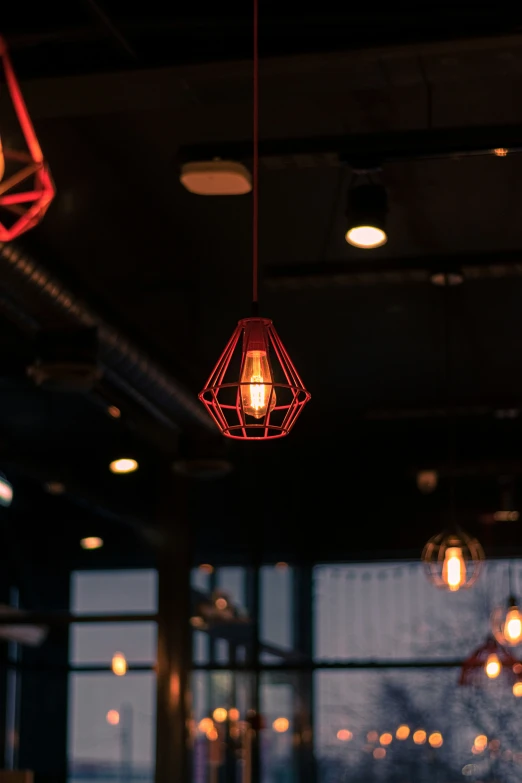 three lights are suspended from the ceiling