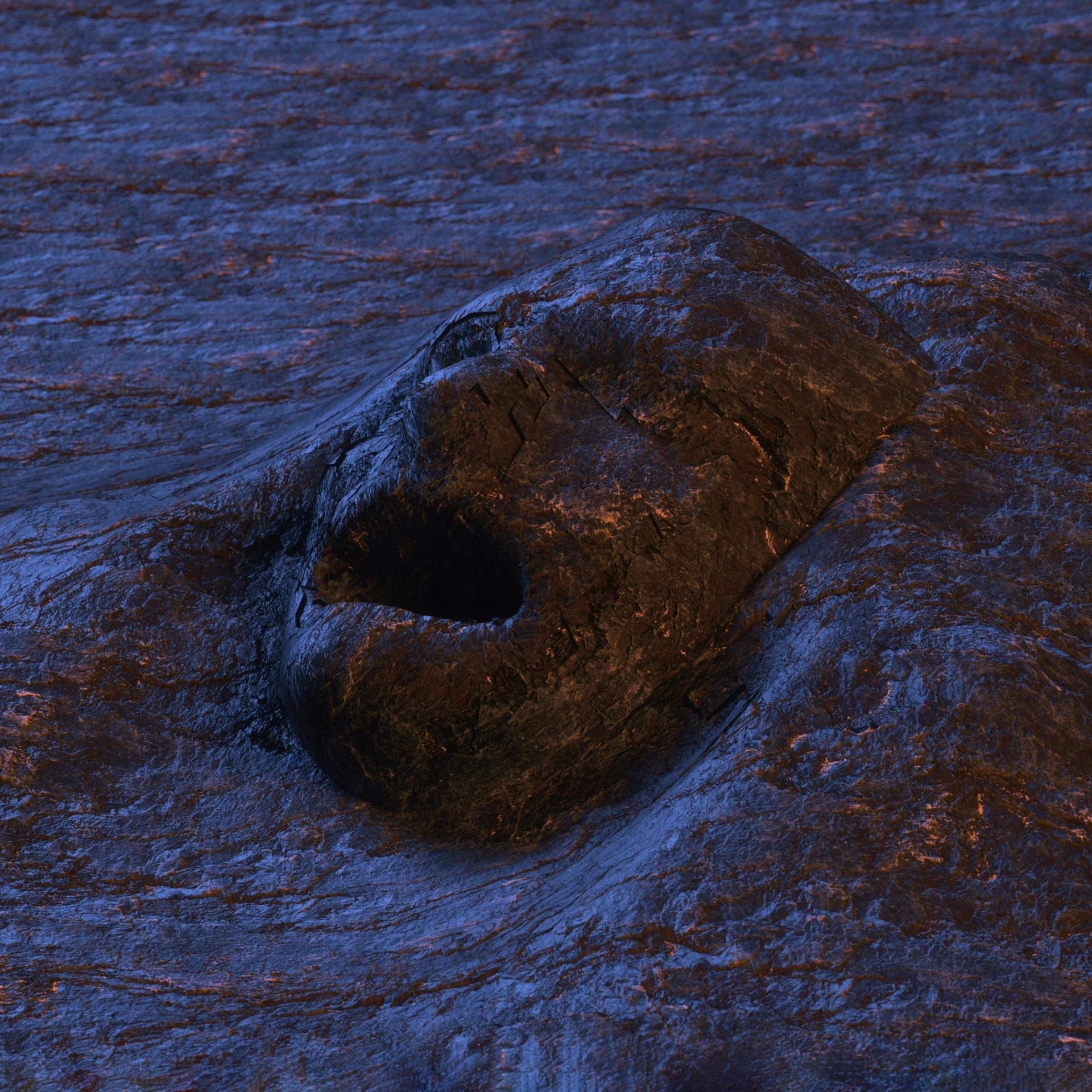 a very dark rock sitting in the middle of a body of water