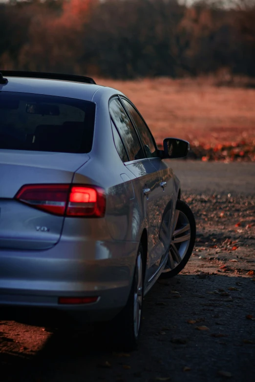 a white car parked on the side of the road