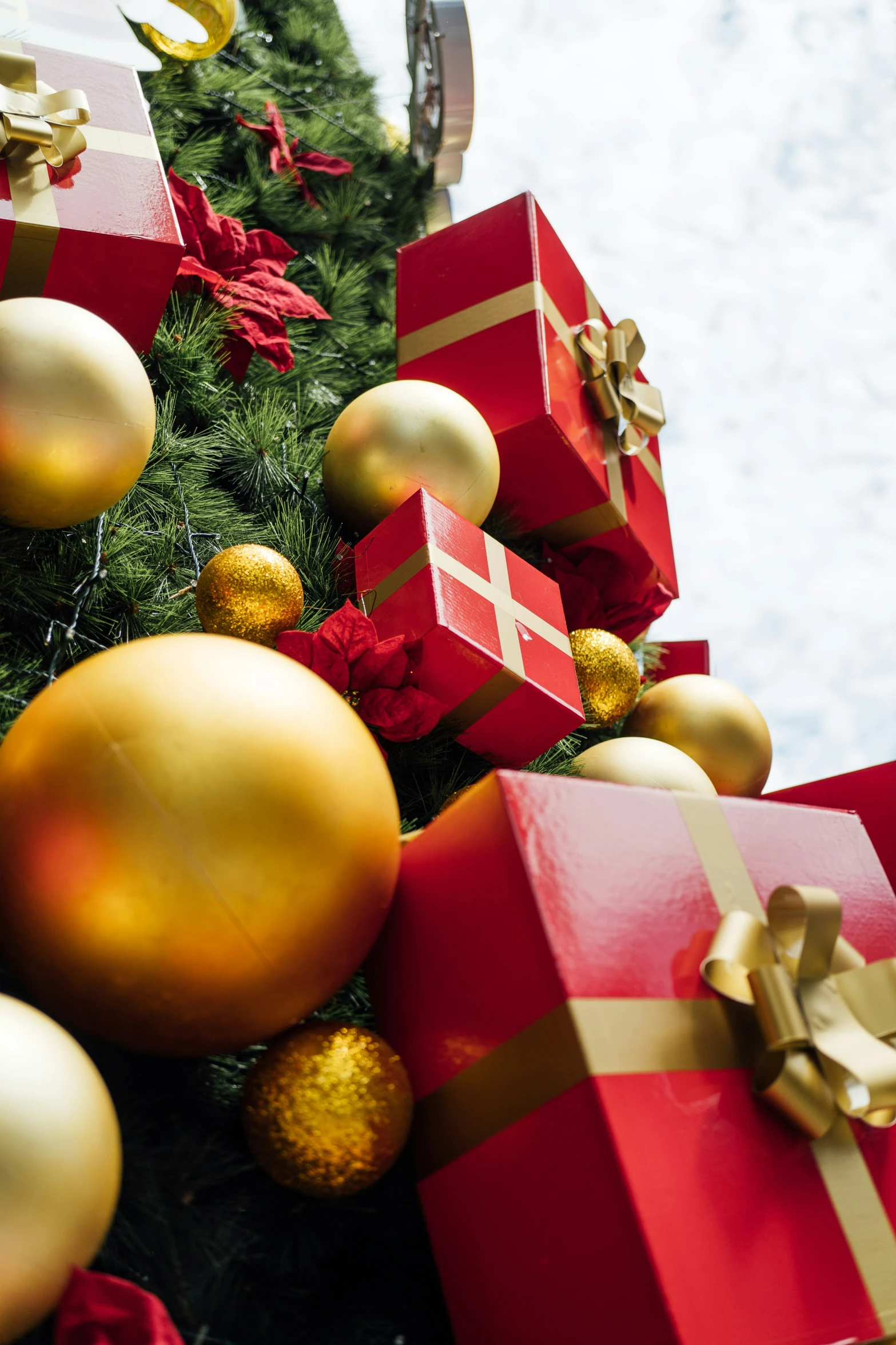 a christmas tree covered in lots of wrapped presents