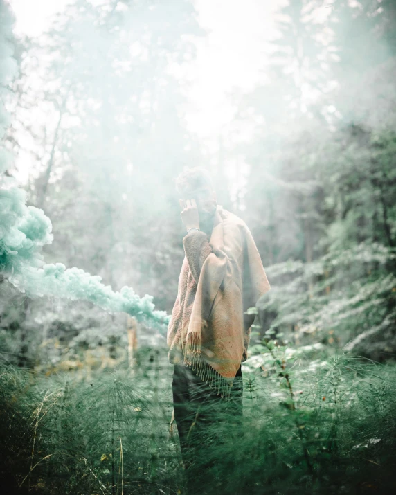 a man standing in the forest, smoke coming out from his nose