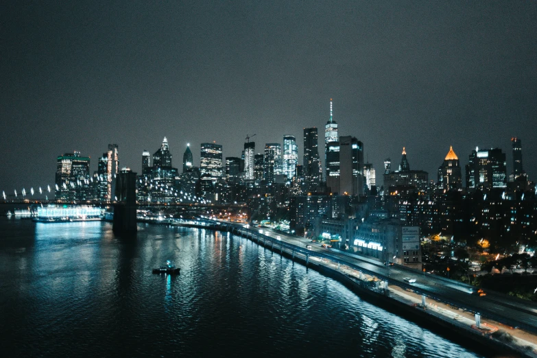 an aerial view of new york city skyline, at night