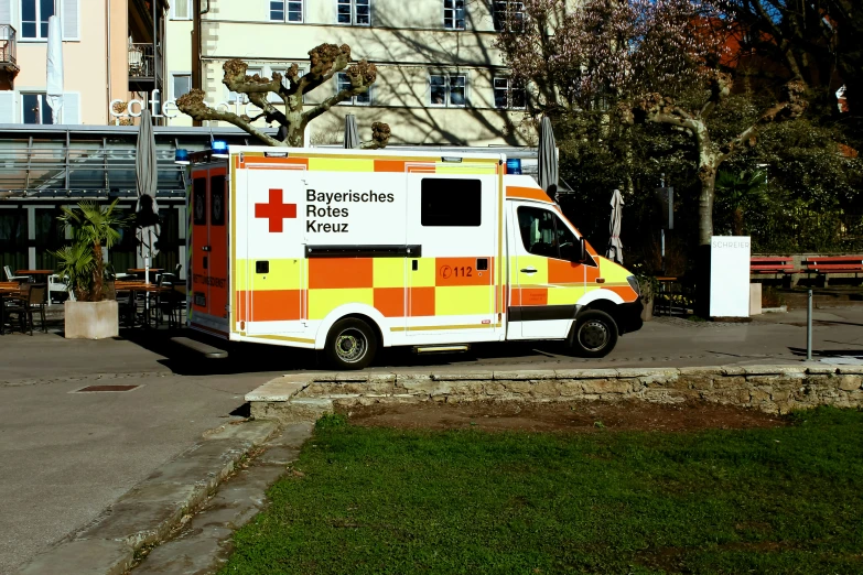 a medicine truck parked next to the street
