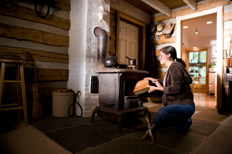 a woman is making food in her home