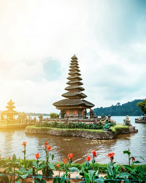 a group of tall buildings sitting on top of a lake