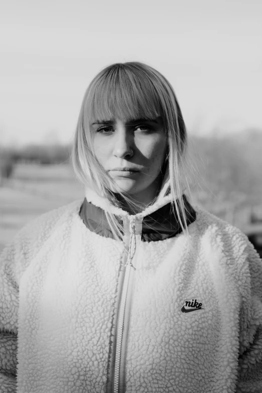 black and white pograph of a woman in a fleece