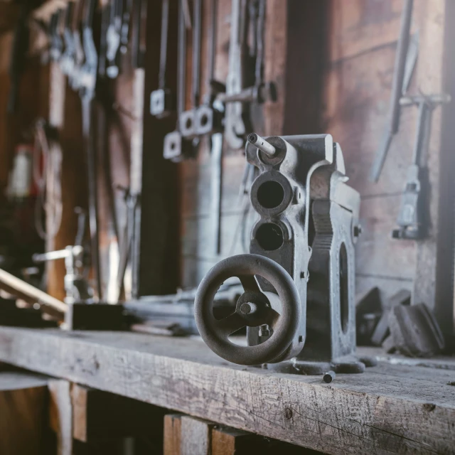 a bunch of tools are on a wooden table