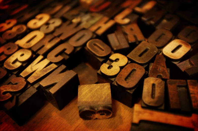 old fashioned wooden type blocks spell out the word numbers