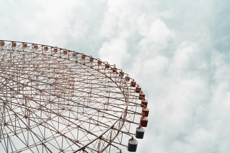 an amut ride at an fair with ferris wheel