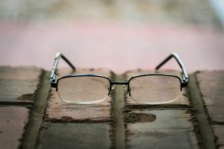 a pair of glasses with a textured background