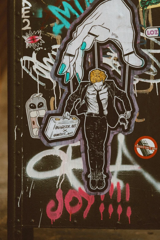 street art that is depicting a person holding a bag