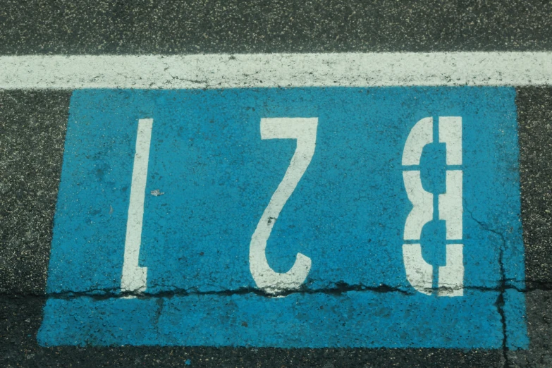 a street sign on asphalt that says s71