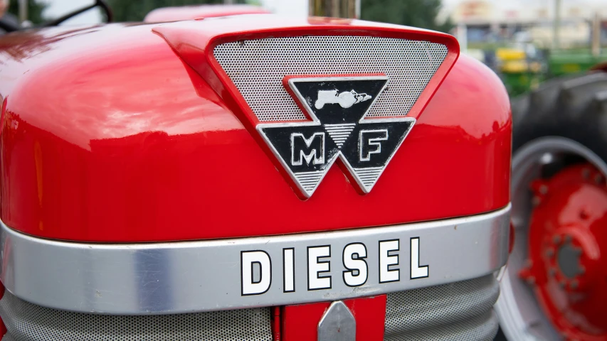 the emblem on this old red diesel is pretty