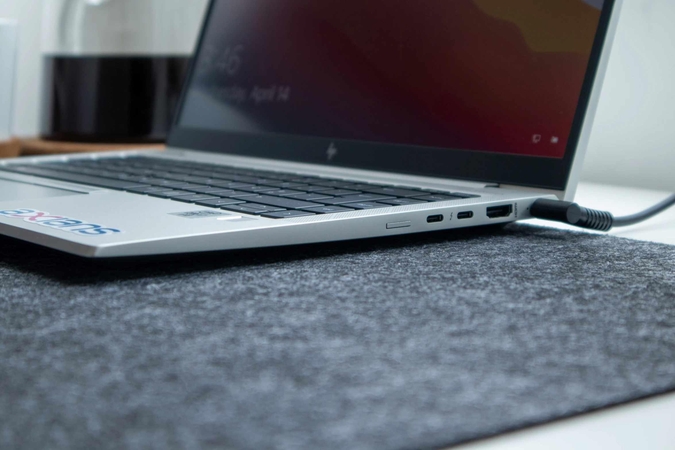 a black and silver laptop on a desk