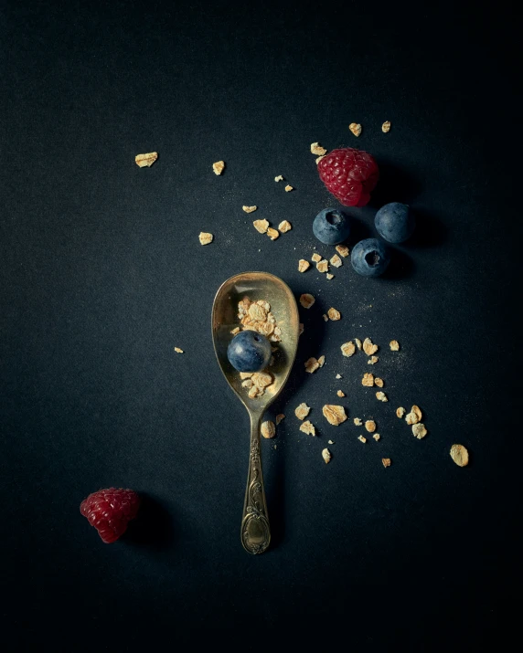 fruit and oatmeal mixed together with a spoon