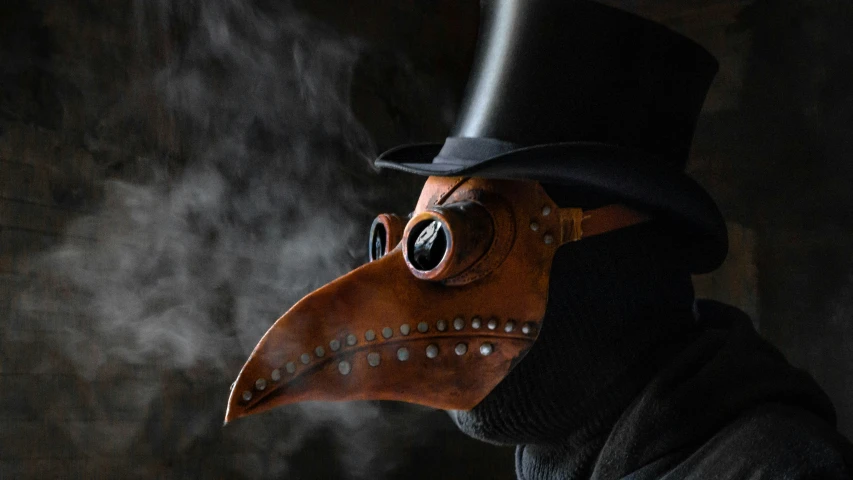 a plague man in a top hat and mask