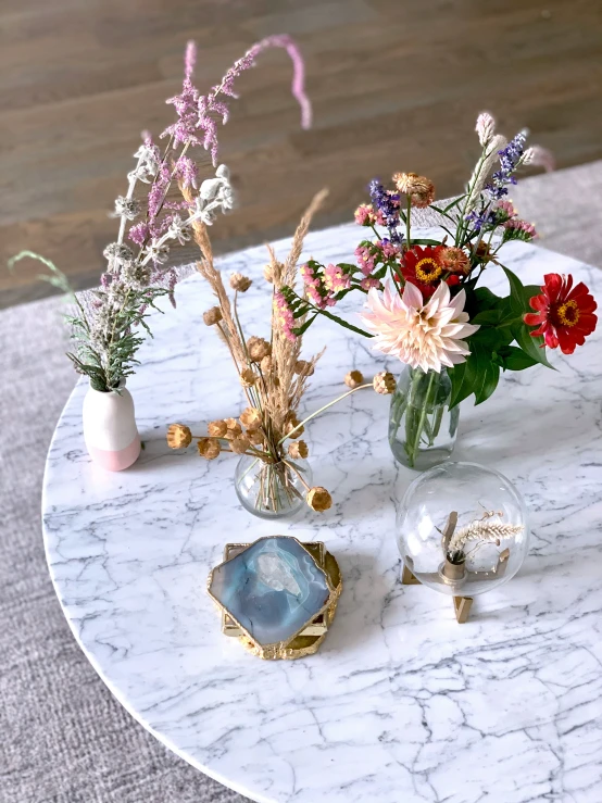 flowers on a marble table with marble top
