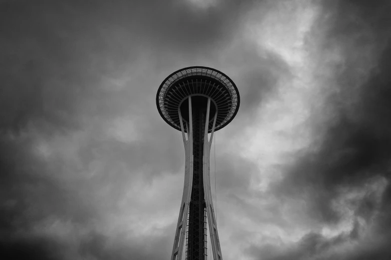 the space needle in seattle is shown in a black and white po