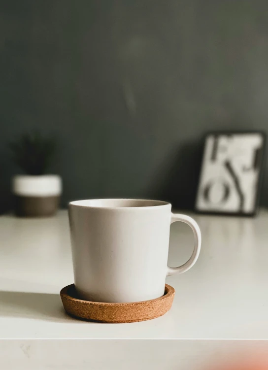 the top half of a cup on a table