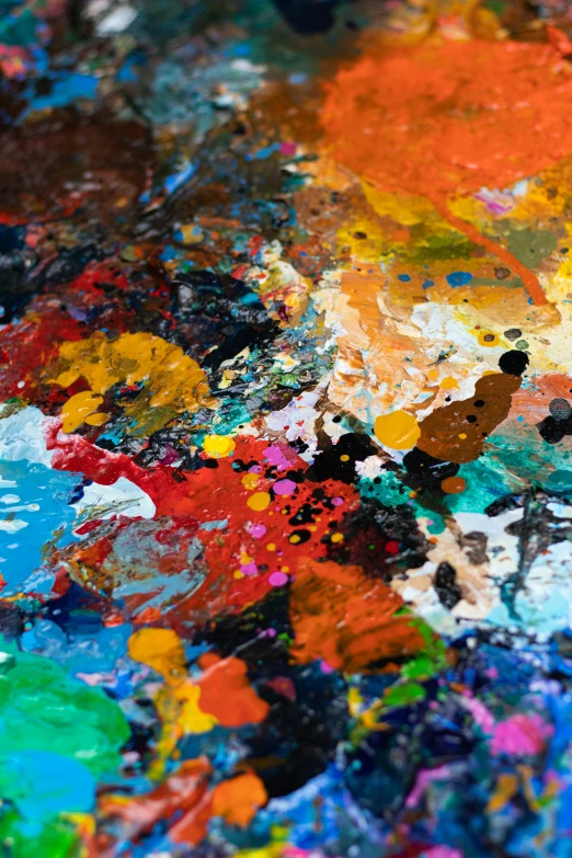 a very close up po of an art easel paint palette