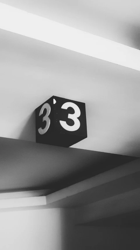 black and white pograph of a house number 23