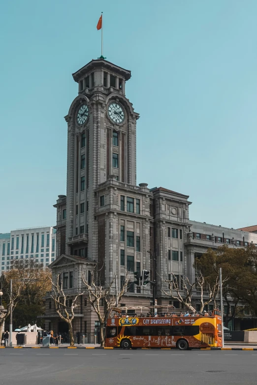 a large brick clock tower on top of a building