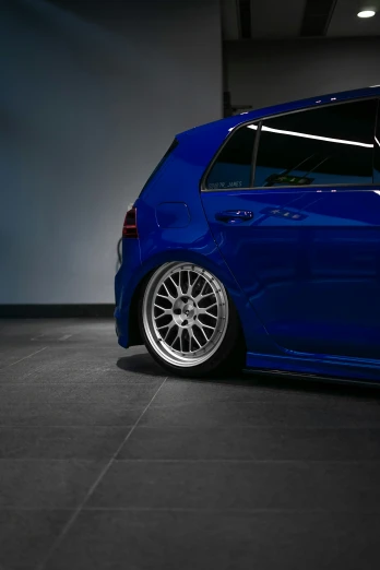 this is a blue wagon with white rims