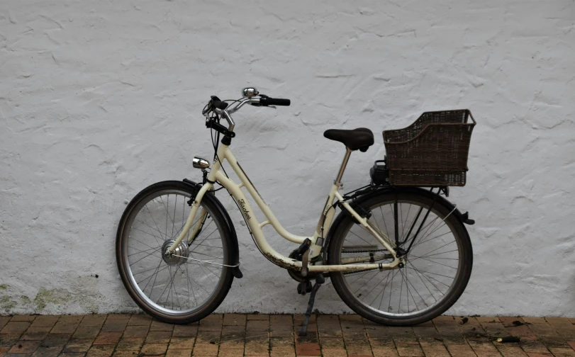 a bike locked up against a wall