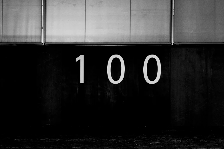 the numbers in front of the wall are the 1, 000