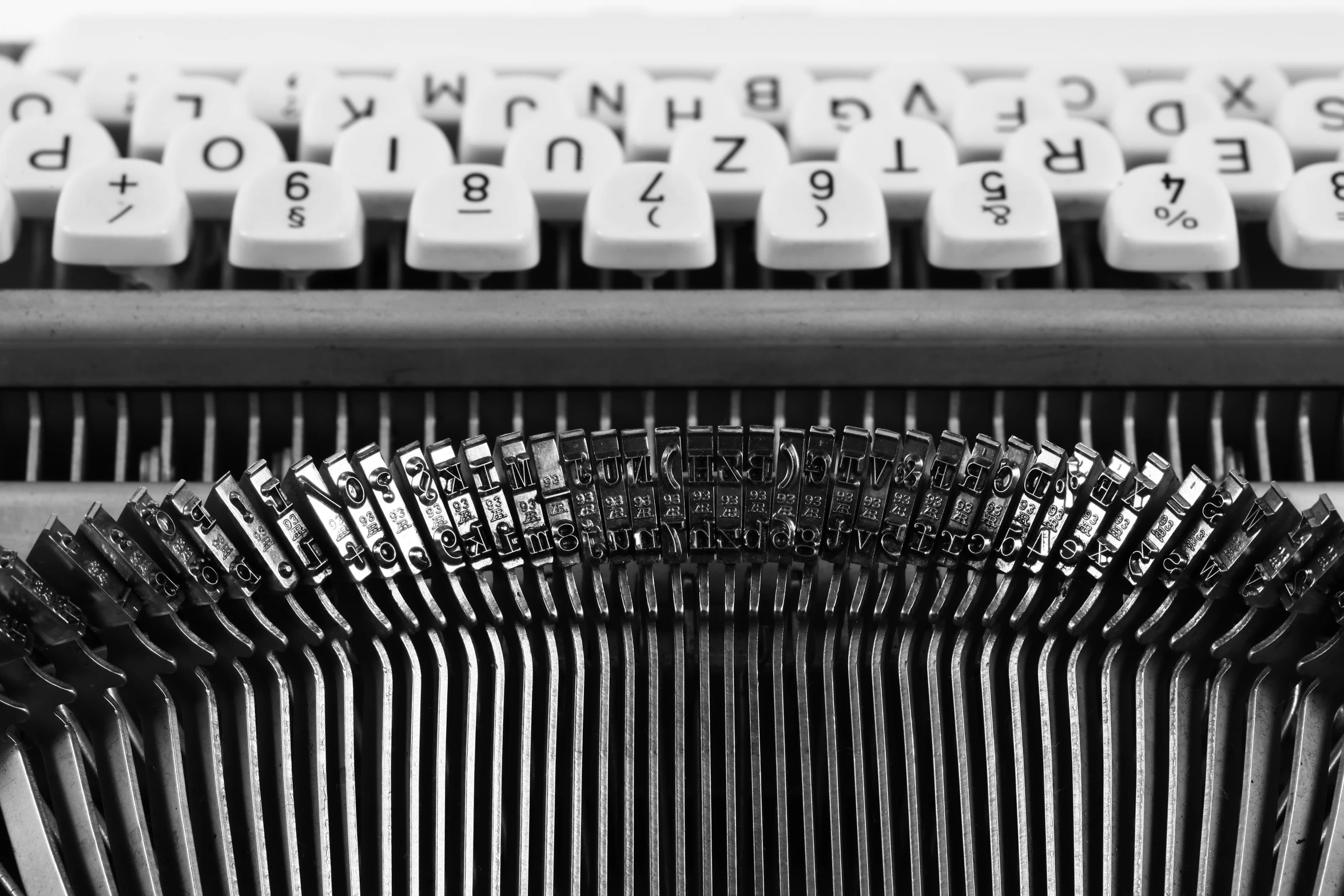 a black and white po of a very old typewriter