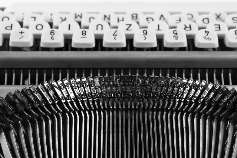 a black and white po of a very old typewriter