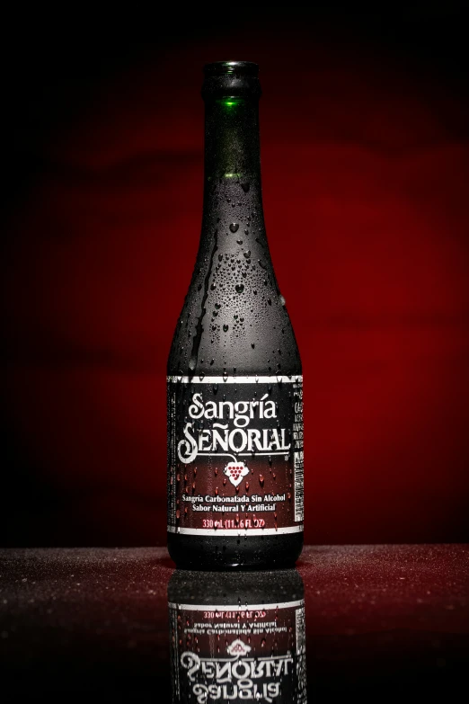 a bottle of sandb special is pographed on a surface