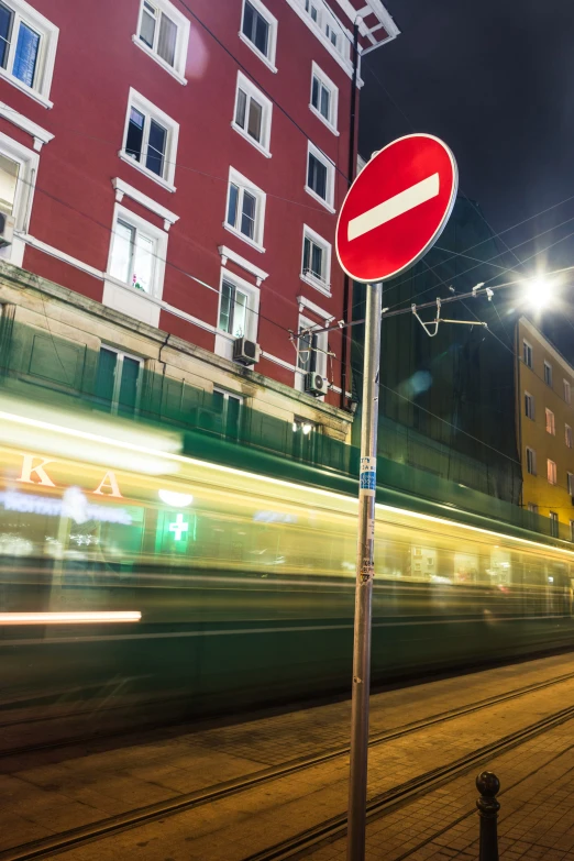 the train is traveling by and its blurry