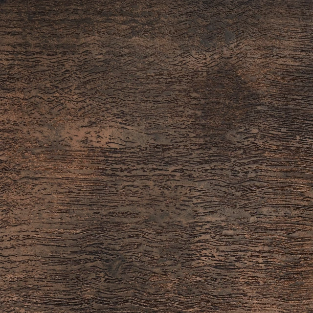 a wood grain surface that is brown and black