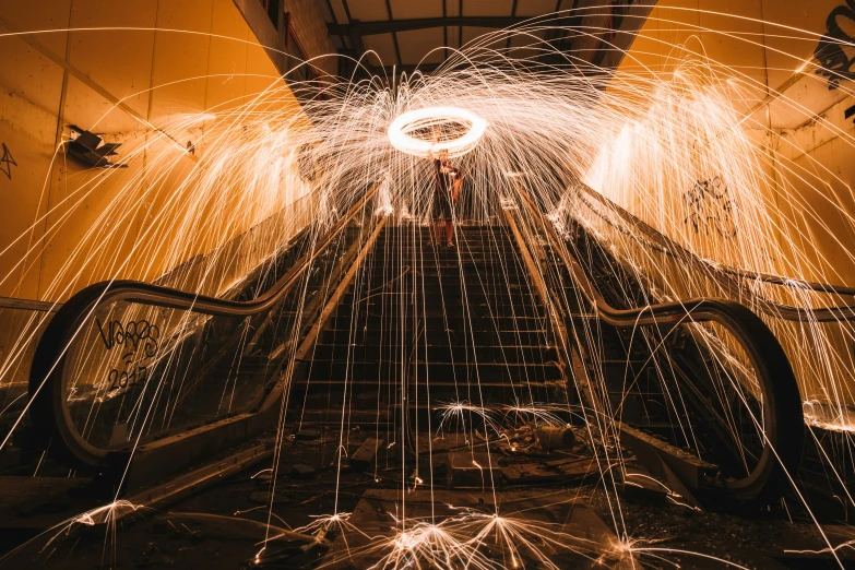 a moving escalator in motion with the lights shining through it