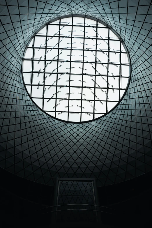 the ceiling of a building with the glass door