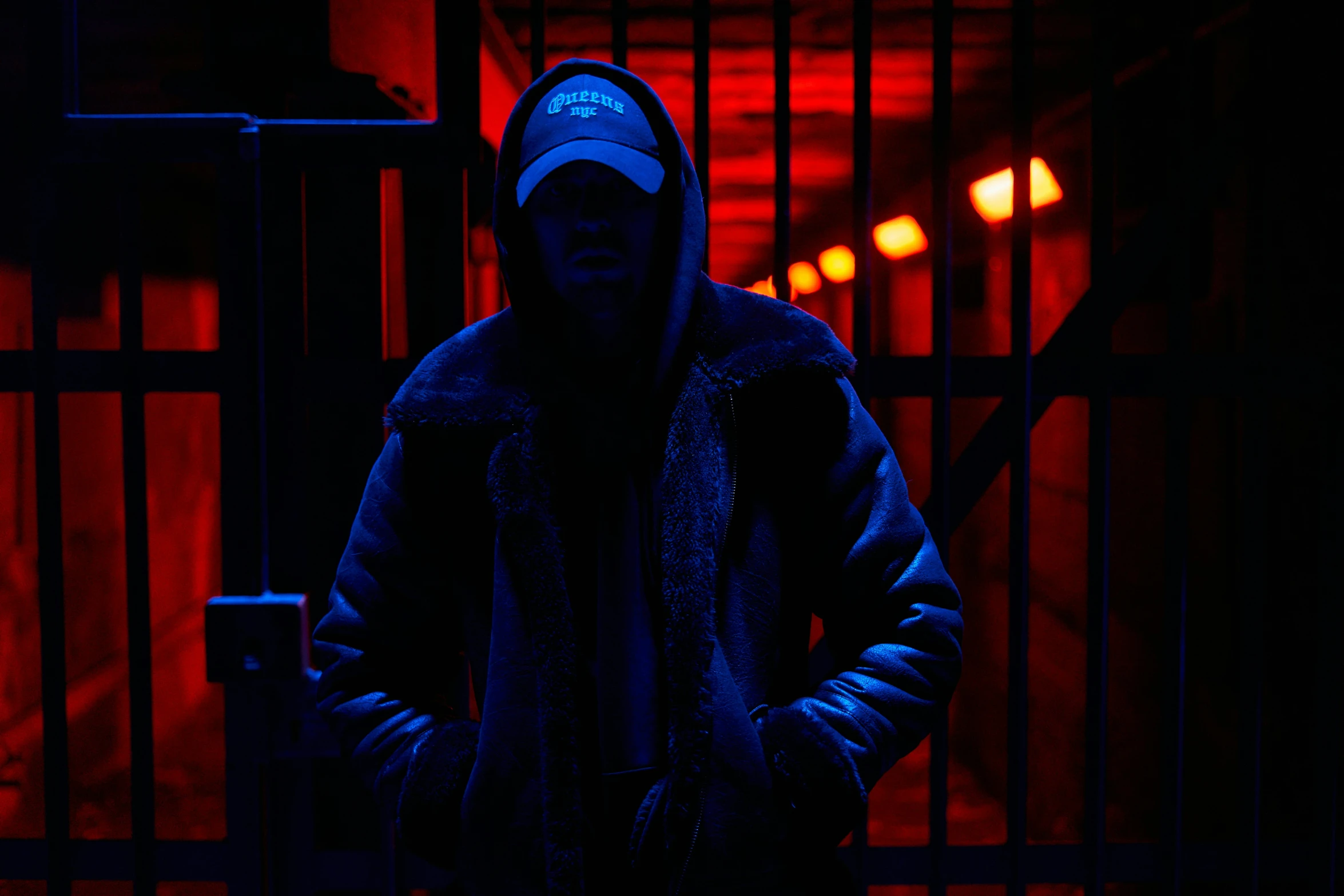 a man standing in front of a  cell